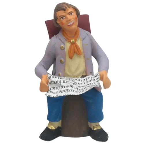 Uomo che legge il giornale in terracotta 10 cm