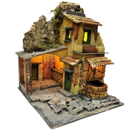 Presepe con luci, pastori e fontana in terracotta 27 cm