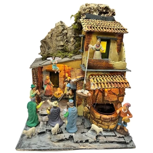 Presepe con luci, pastori e fontana in terracotta 27 cm