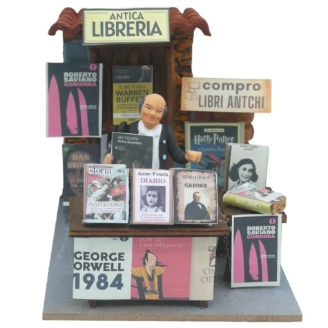Antica Libreria uomo in movimento 10 cm