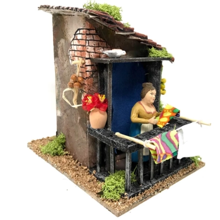 Casa Napoletana con donna che stende i panni