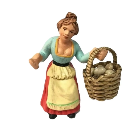 Donna con cesto di uova in terracotta 10 cm