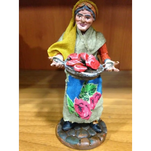 donna con piatto di carne in terracotta presepe san gregorio armeno